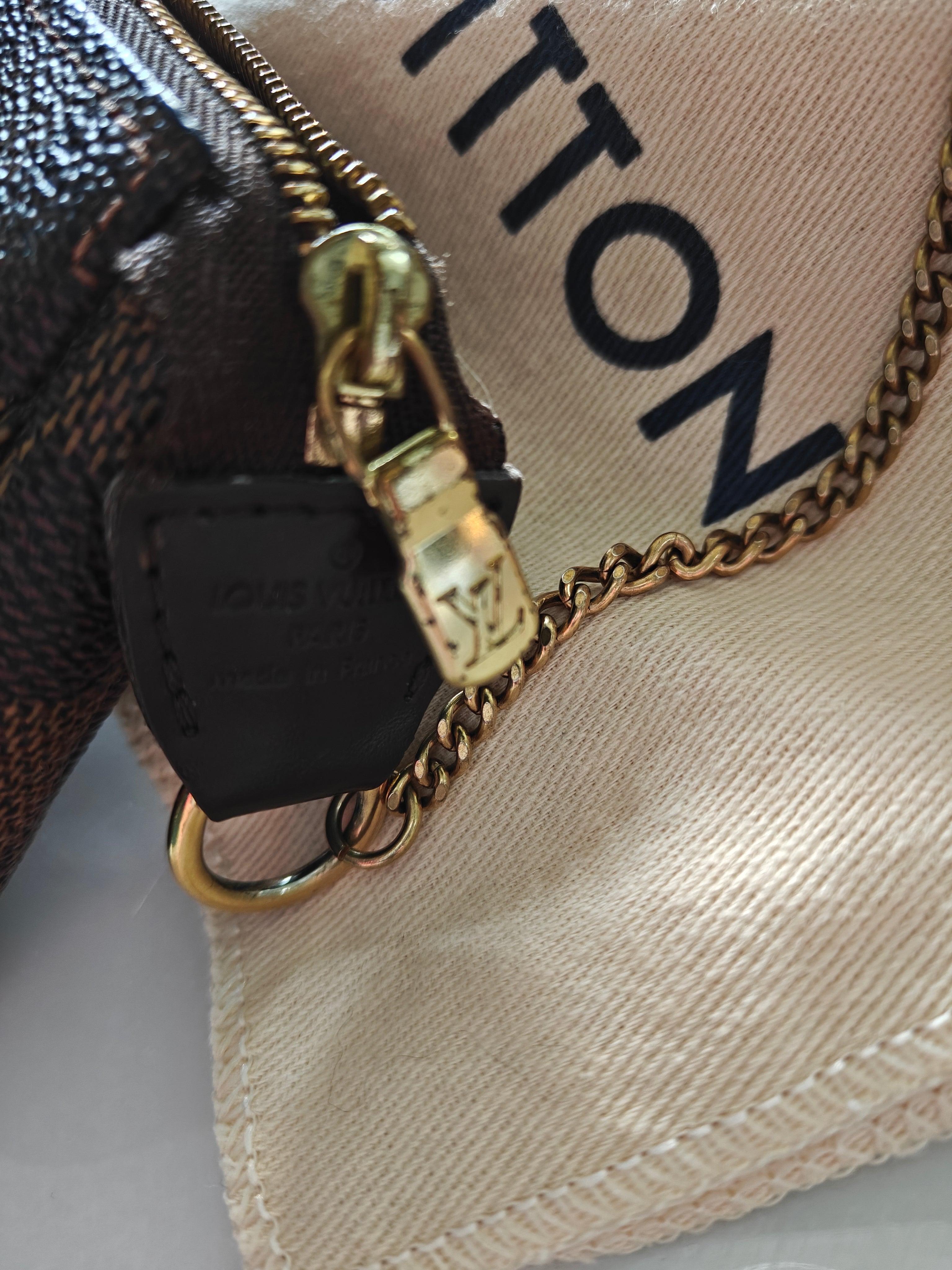 Louis Vuitton Pochette Accessoire Cloth Clutch Bag