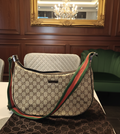 Gucci GG Canvas Web Halfmoon Crossbody bag