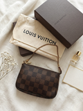 Louis Vuitton Pochette Accessoire Cloth Clutch Bag