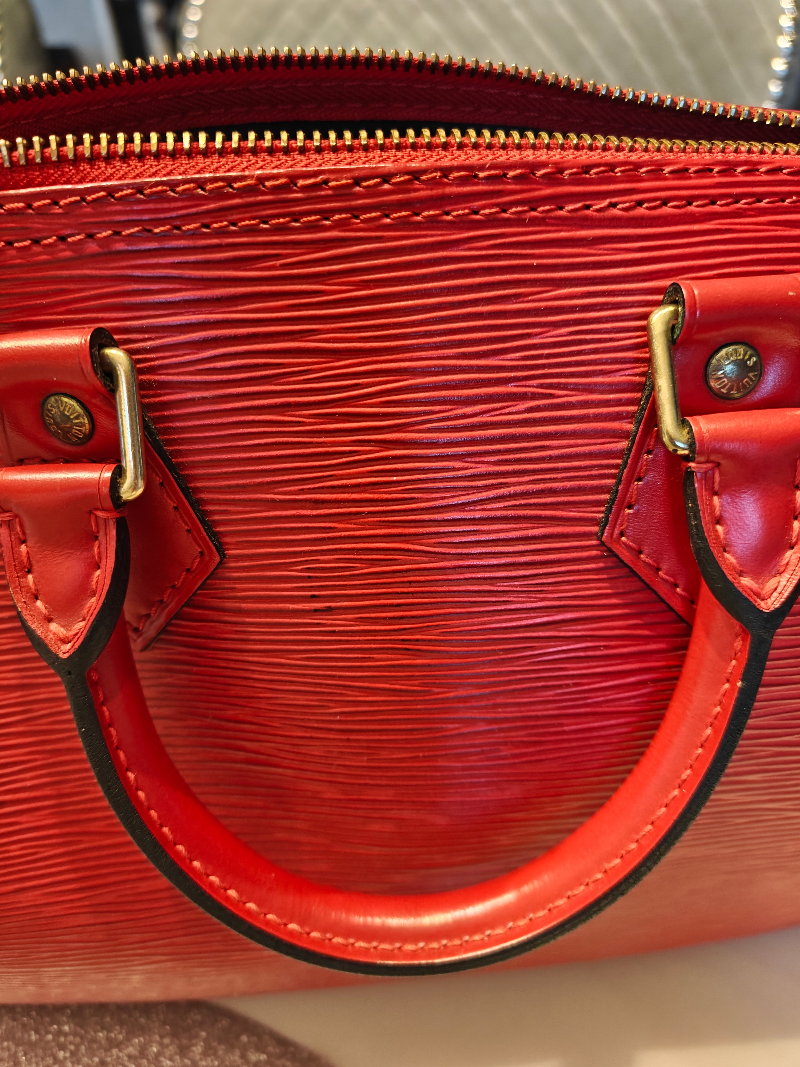 Louis Vuitton Speedy Leather Handbag Red